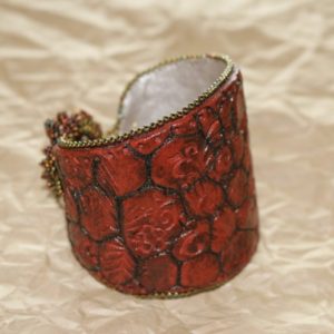 Faux leather with beaded clasp